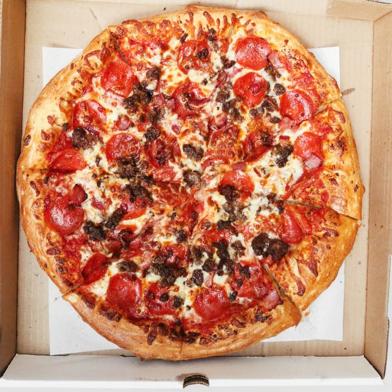 Indulge in Our Meat Pizza